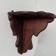 Pair of antique carved wooden shelves