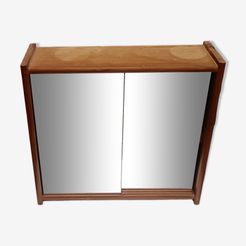 Small wall-mounted bathroom cabinet with vintage mirror doors