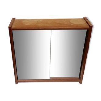 Small wall-mounted bathroom cabinet with vintage mirror doors
