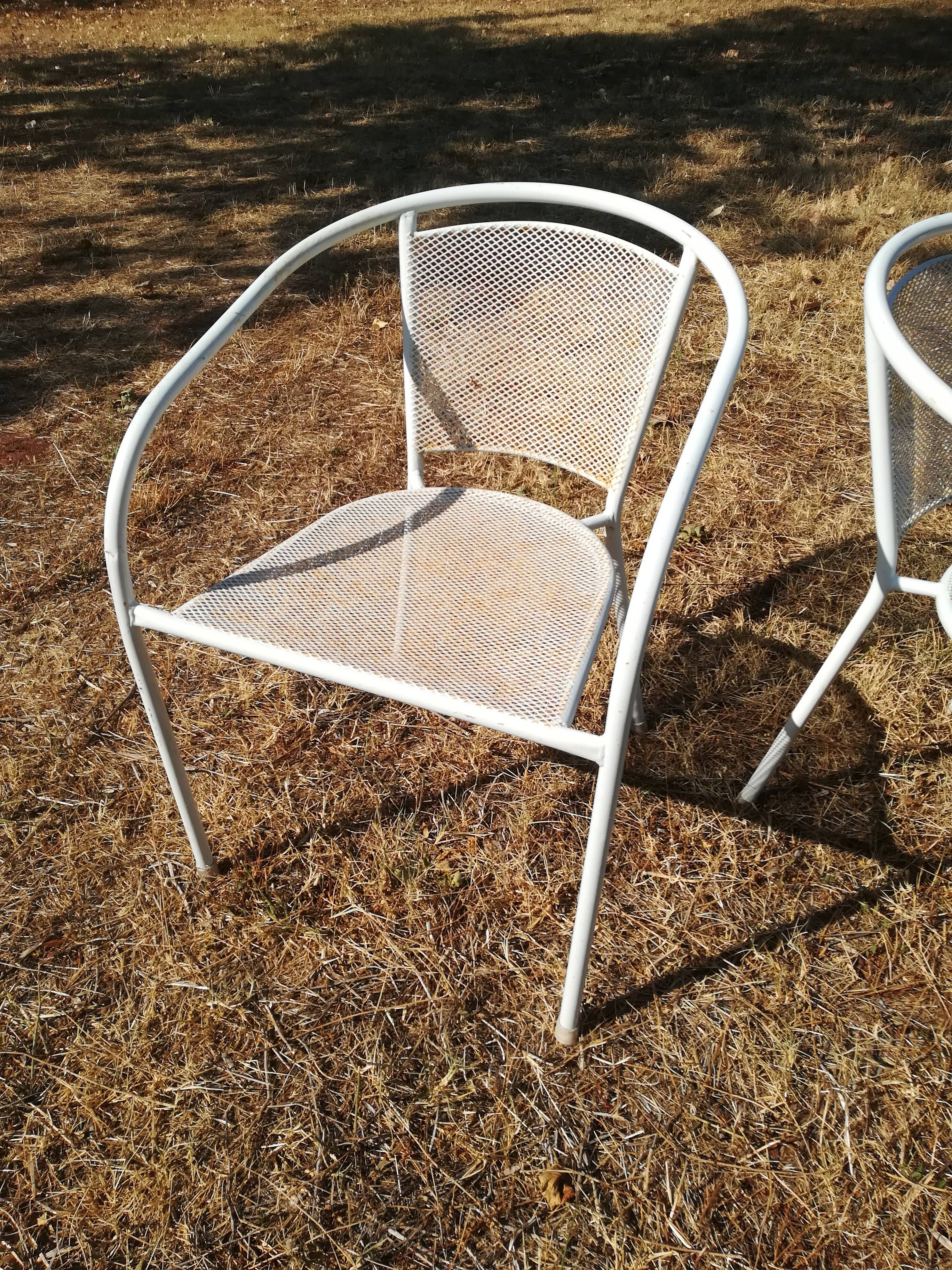 Pair of vintage white metal terrace armchairs