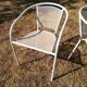 Pair of vintage white metal terrace armchairs
