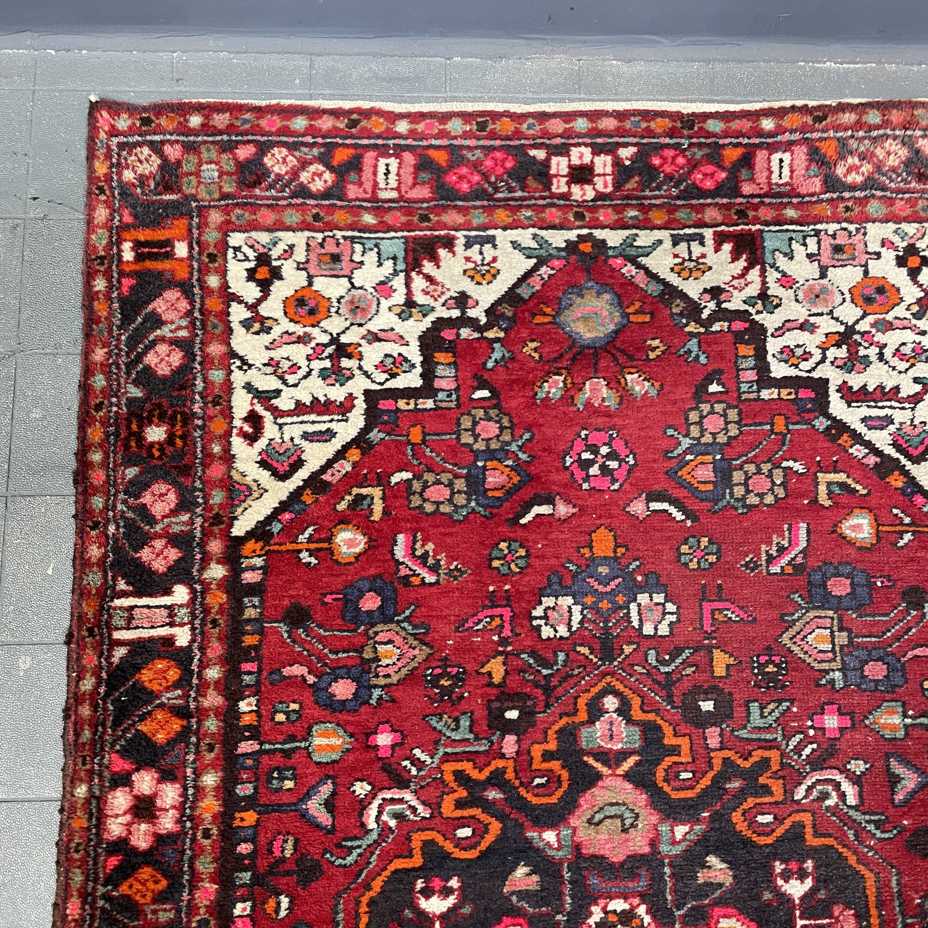 Worn vintage oriental rug or carpet
