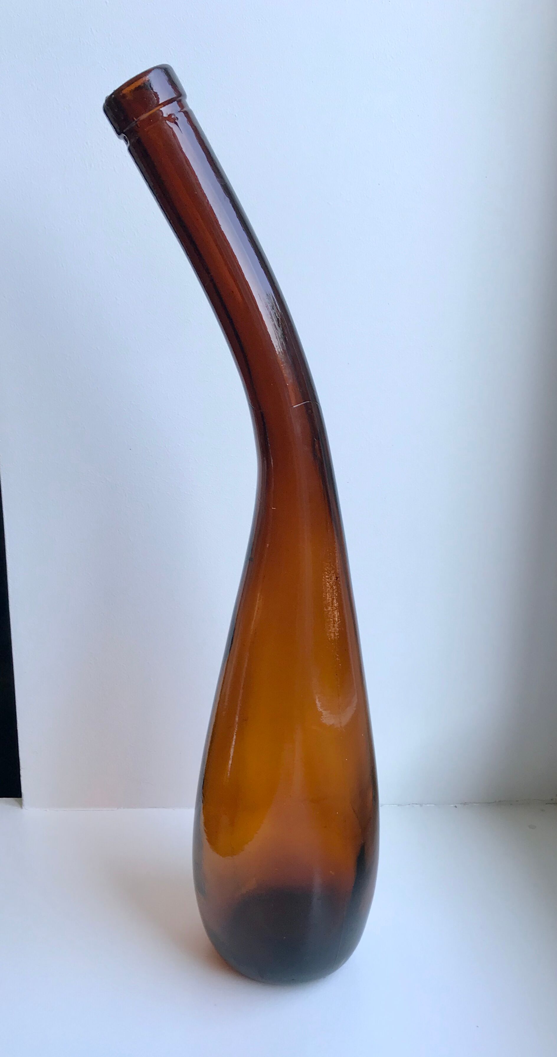 Amber bottle in blown glass 70s