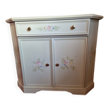 Wooden sideboard with floral patterns