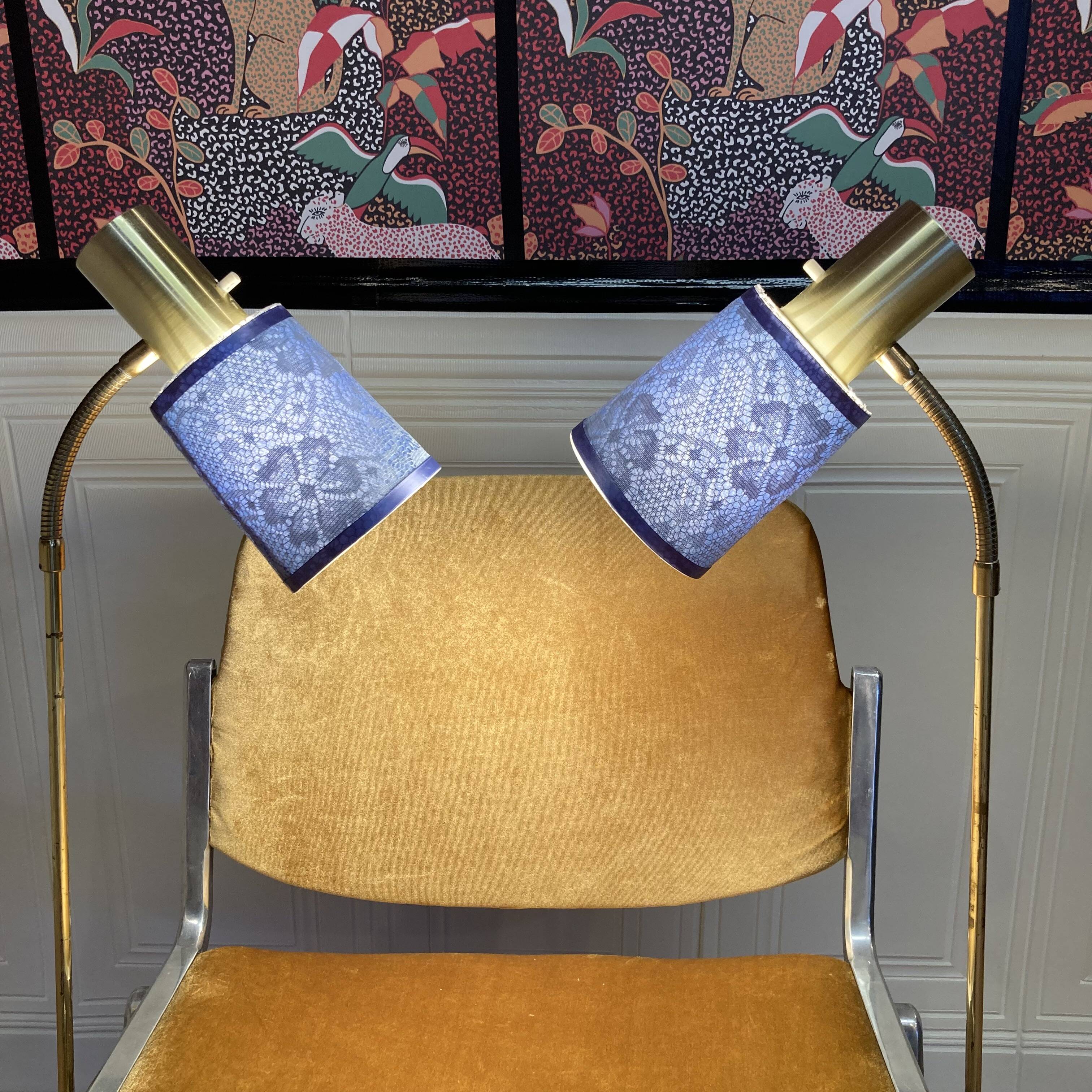 Pair of large modular industrial lamps from the 1950s.