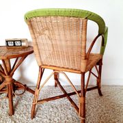 1950s 60s rattan armchair with green apple and black piping.