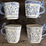 Antique Chinese tea set decorated with dragons.