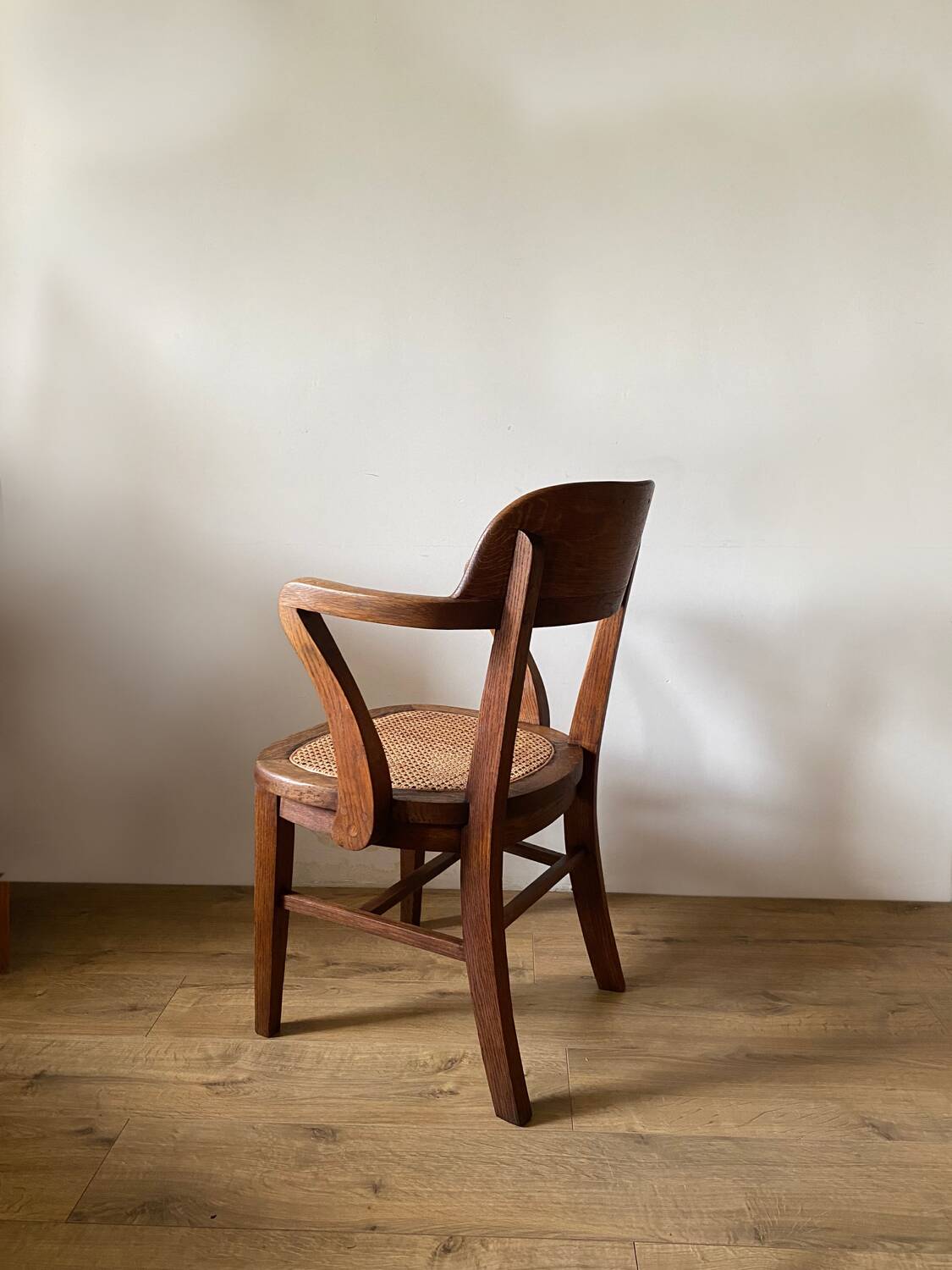 Solid oak and cane armchair