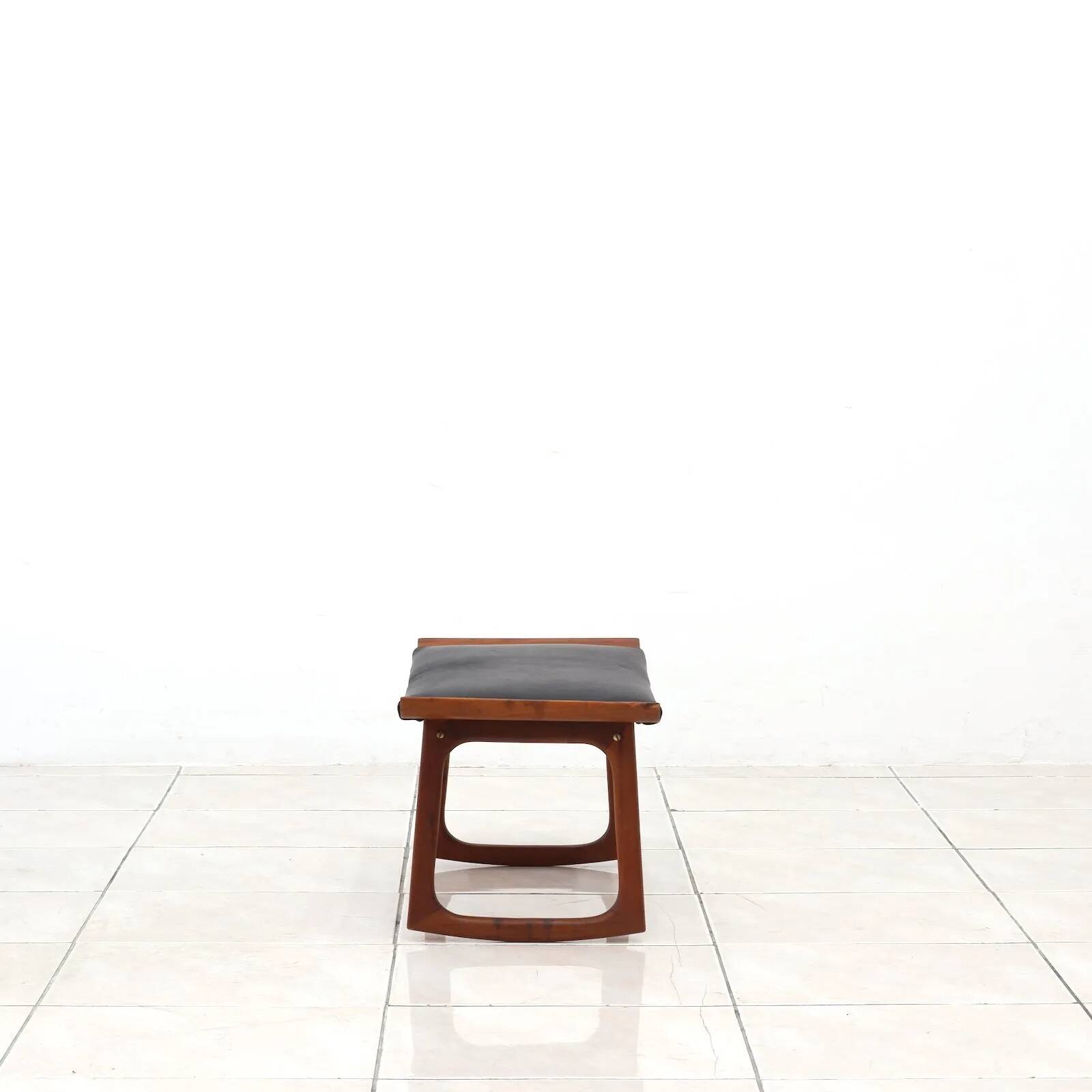 Rocking stool by Finn Juhl