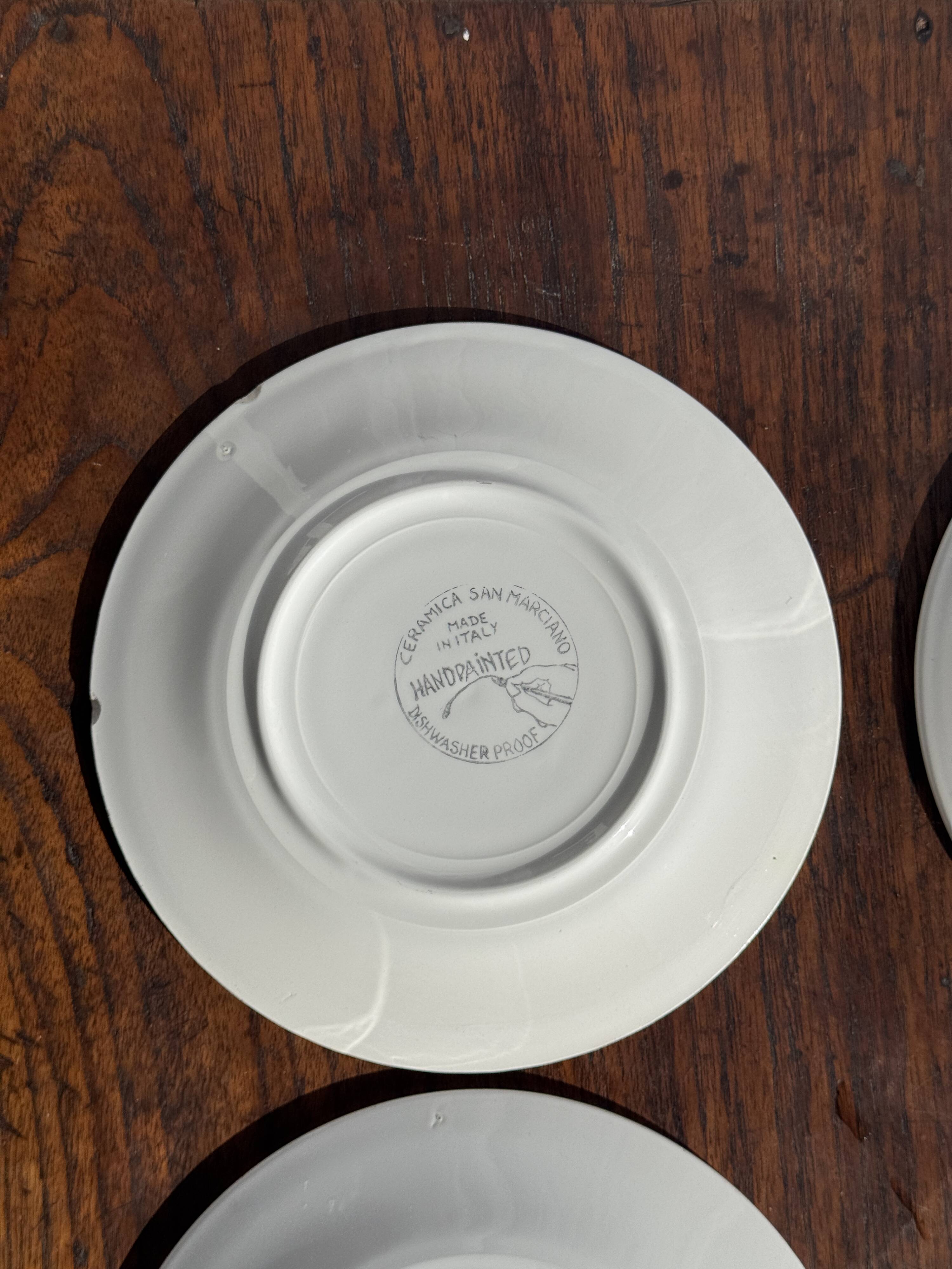 Set of 4 Italian ceramic plates in green, orange, and yellow splashes D20.