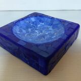 Blue mosaic pocket emptier