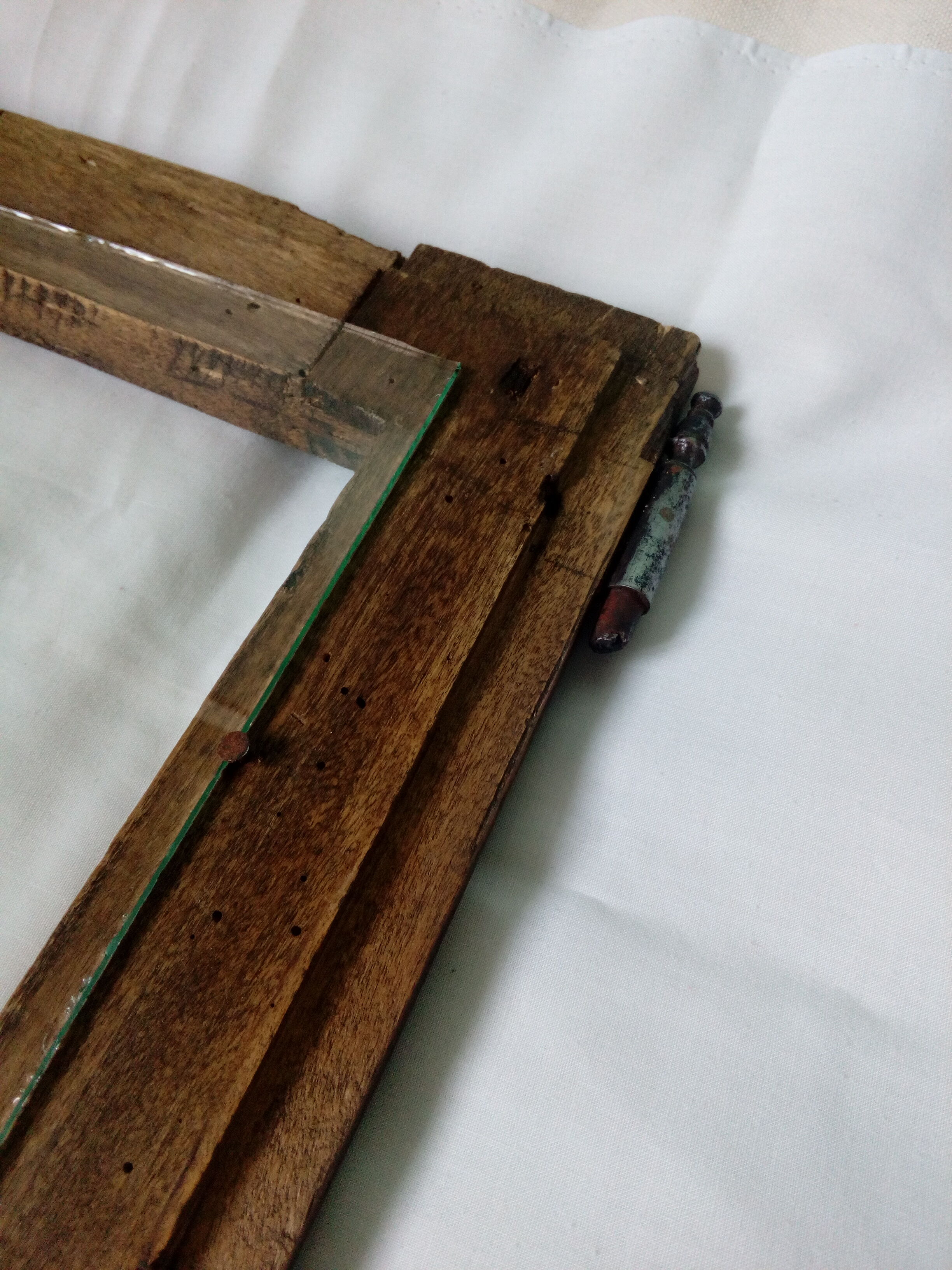 Wooden glass door with iron latch