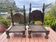 Pair of traditional Indian antique chairs in carved wood.