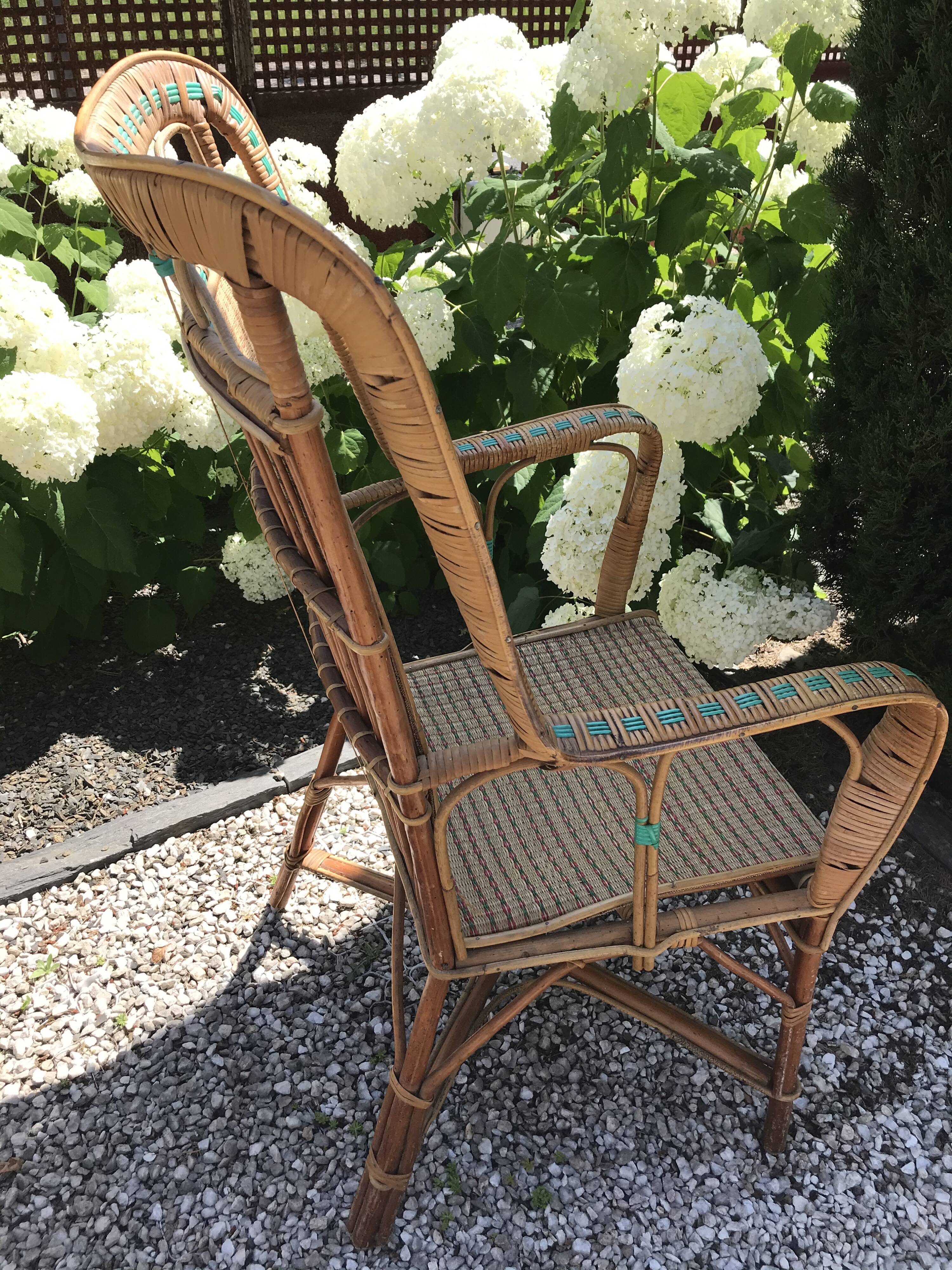 Rattan armchair with high back