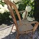 Rattan armchair with high back
