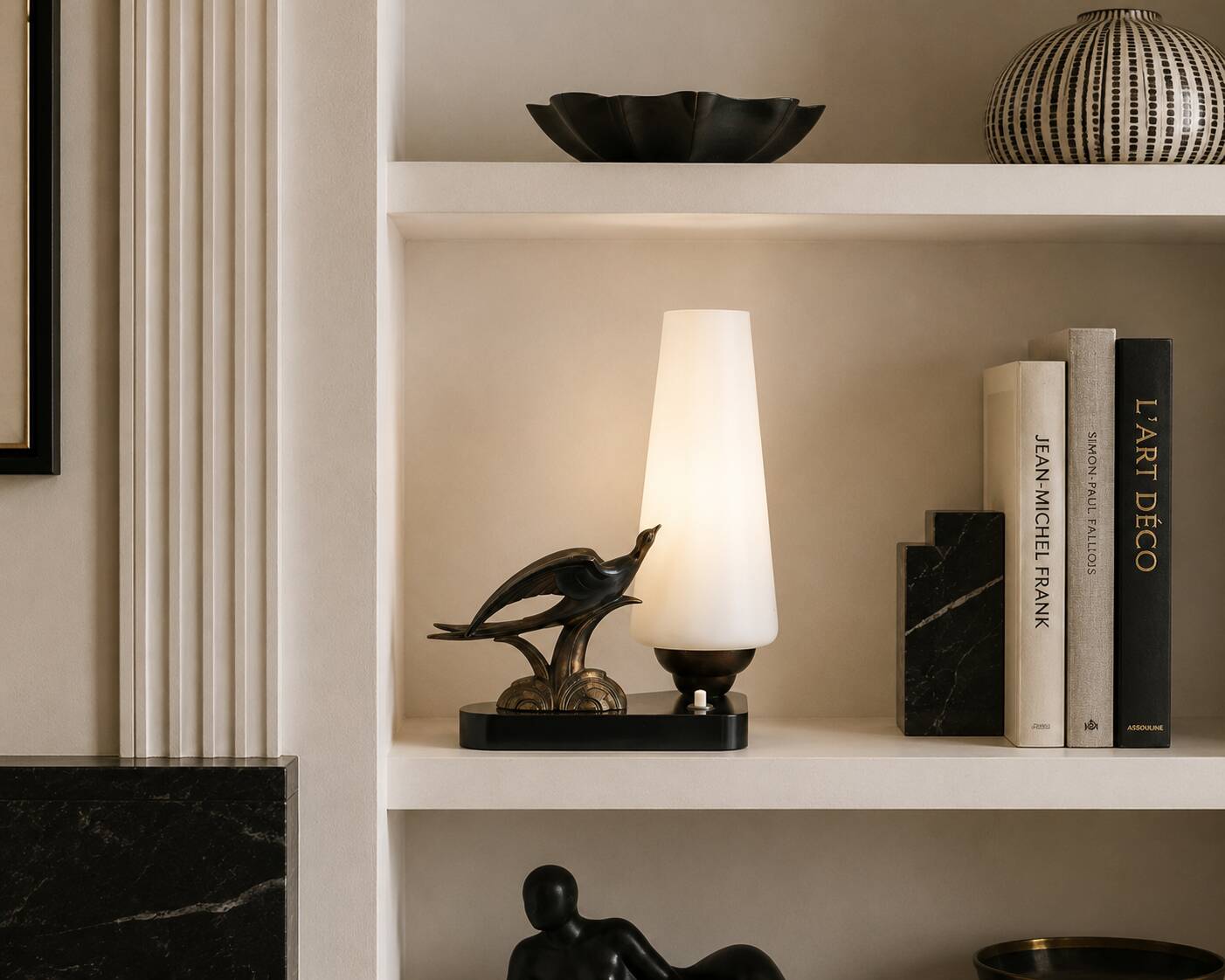 Art Deco lamp with swallow sculpture, marble base, opaque white globe.