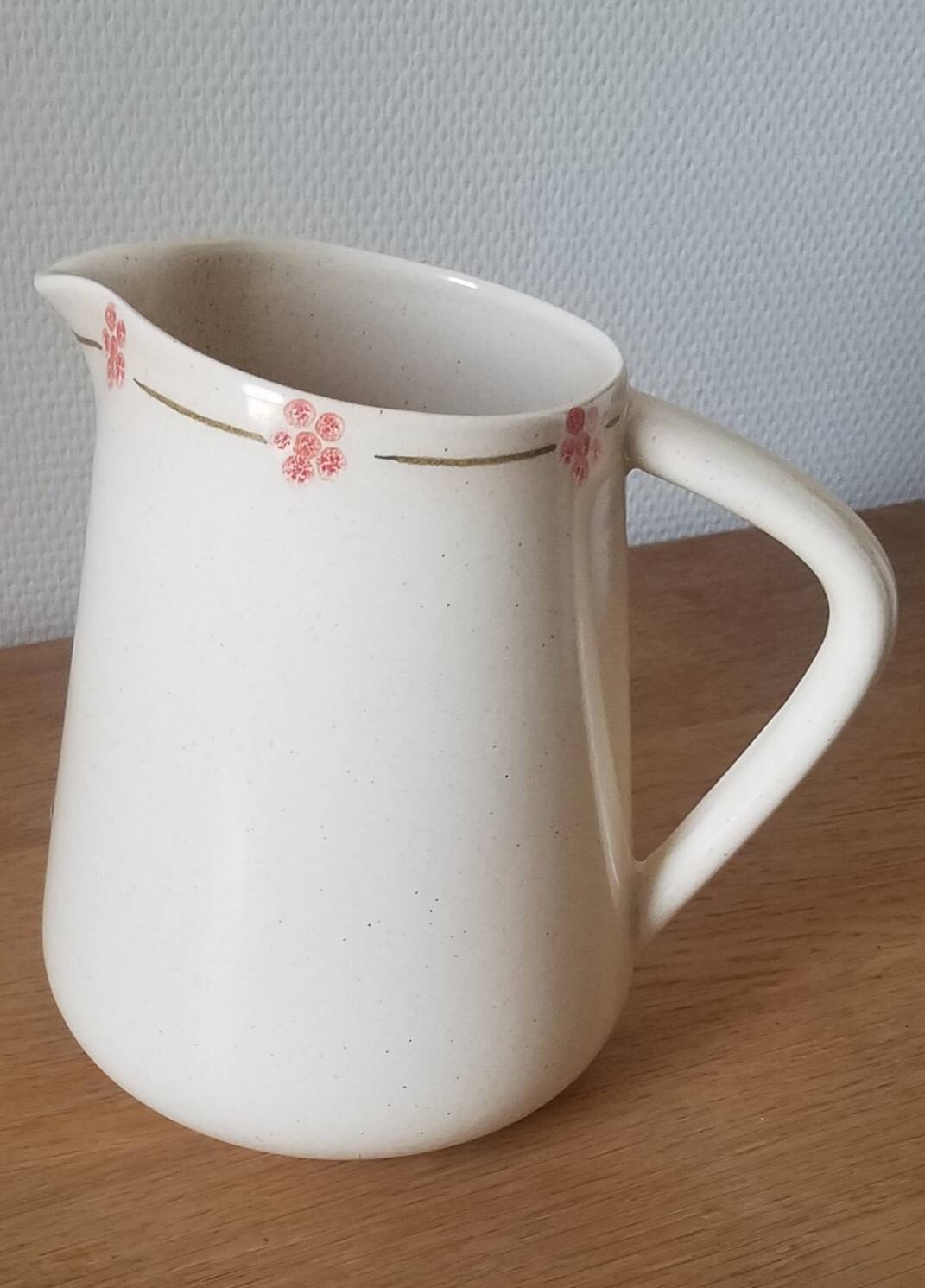 Hand-painted glazed ceramic pitcher