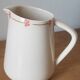 Hand-painted glazed ceramic pitcher