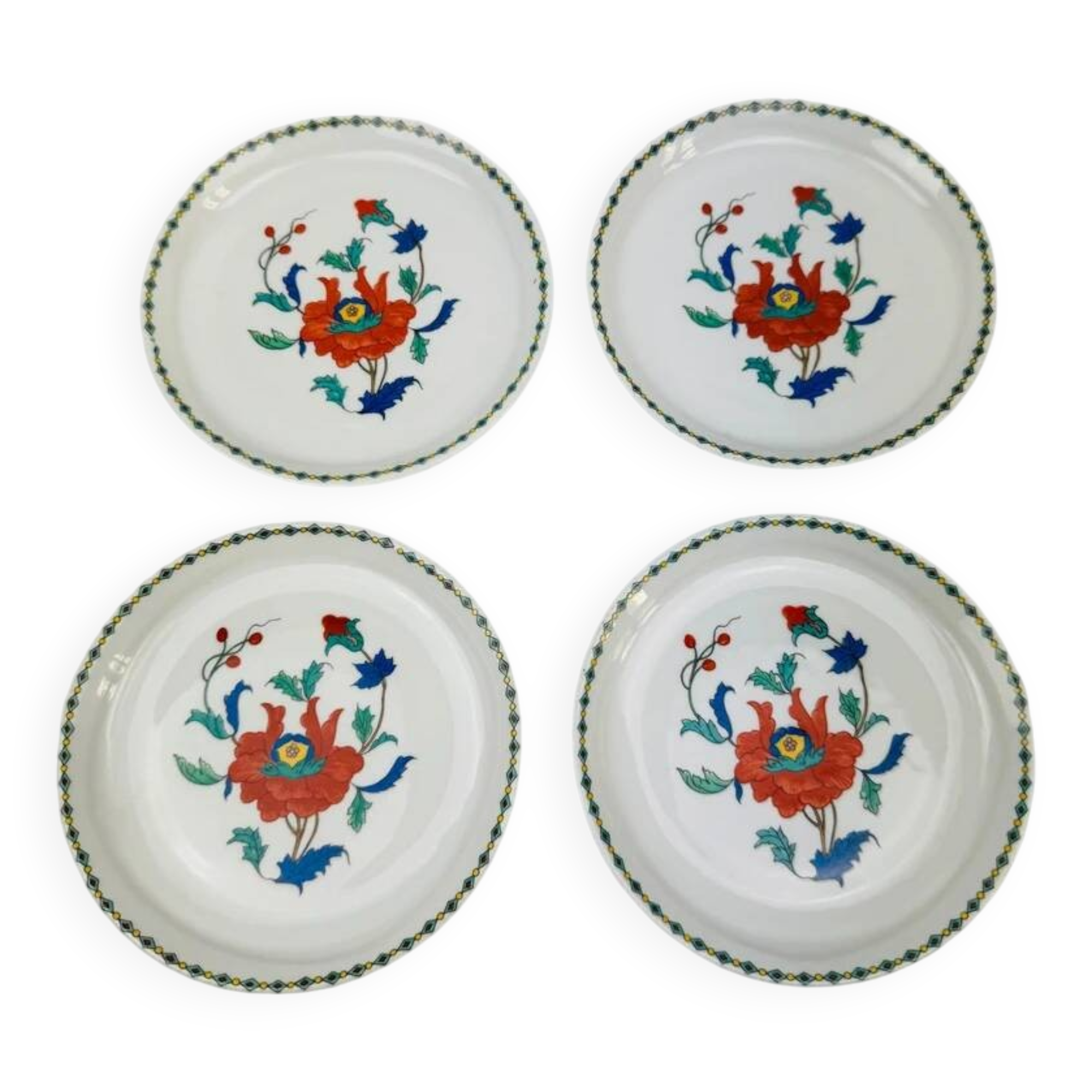 4 porcelain bowls from Paris, decorated with red and blue poppy flowers