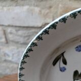 Old deep iron earth plate with blue flower pattern