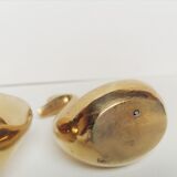 Two ducks made of solid brass