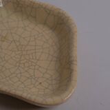 Ceramic pocket emptier