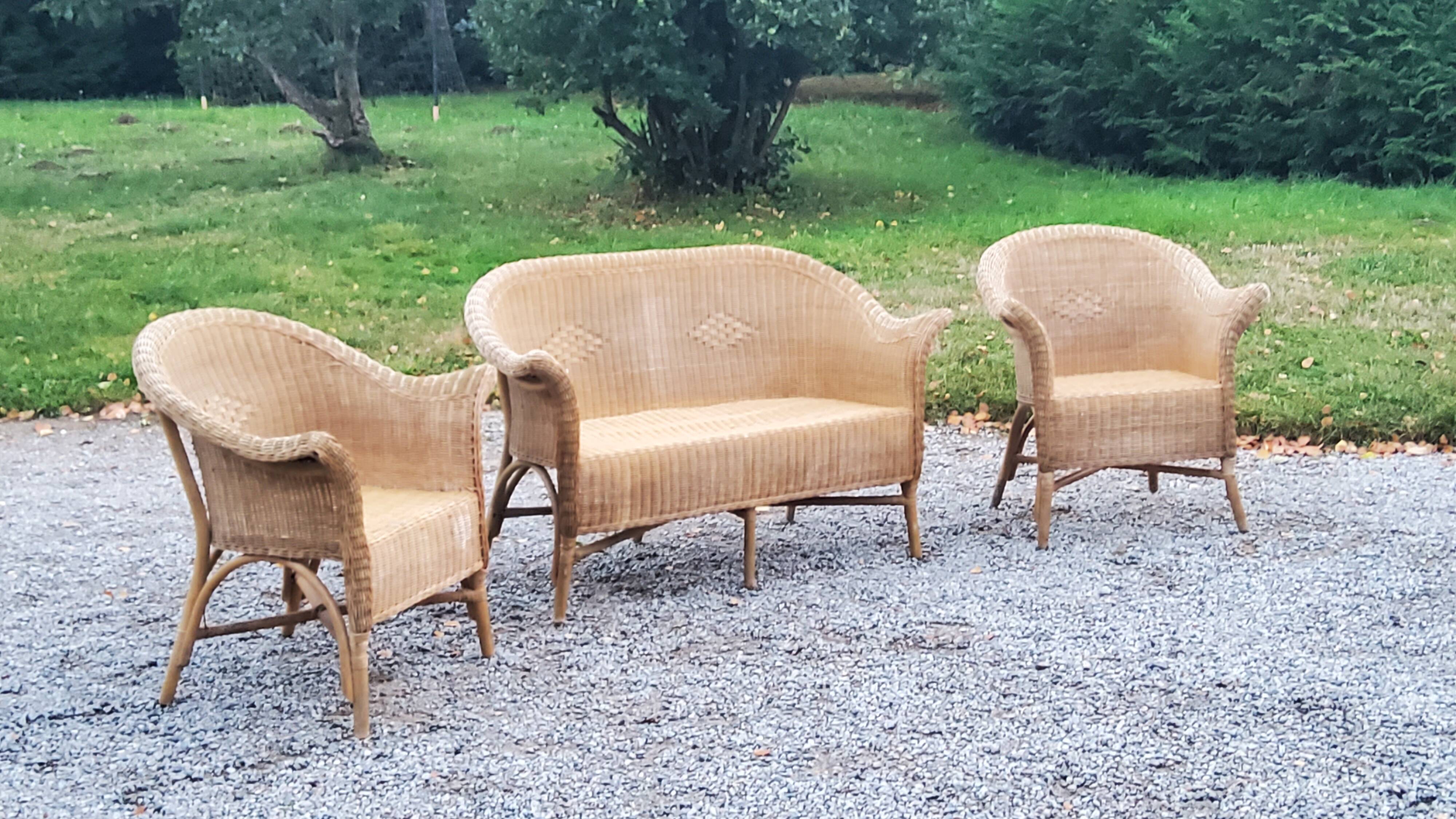 Pair of armchairs and bench in rattan and bamboo from the 60s/70s