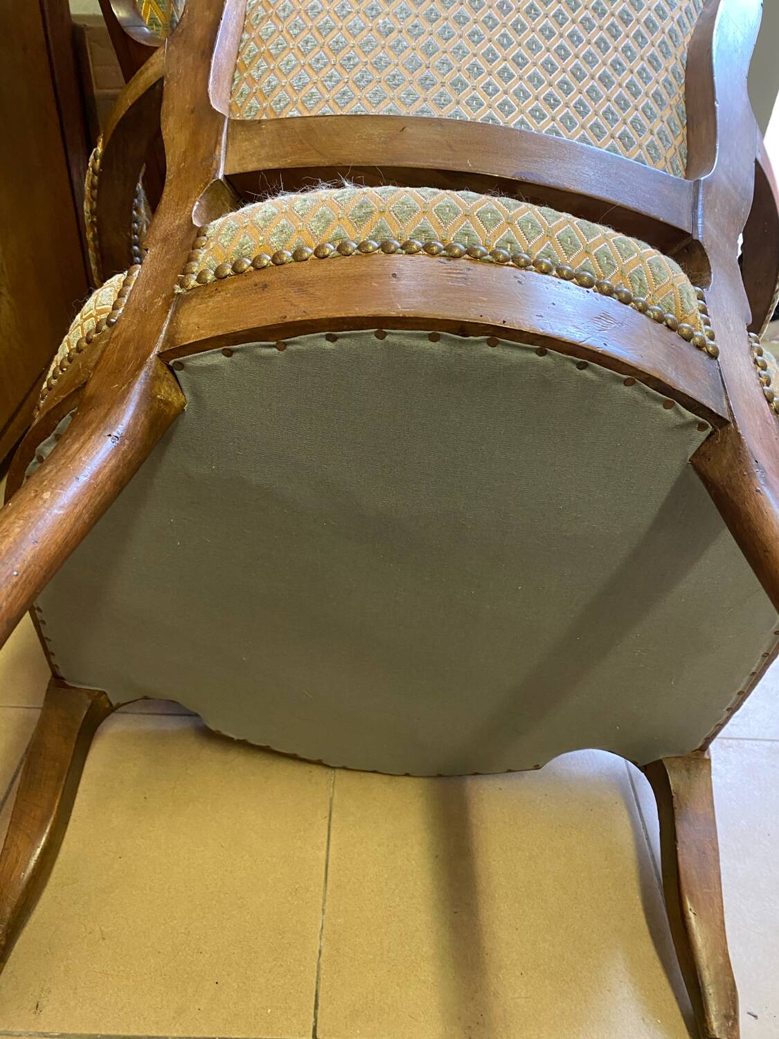Two Louis XV style wooden and fabric armchairs