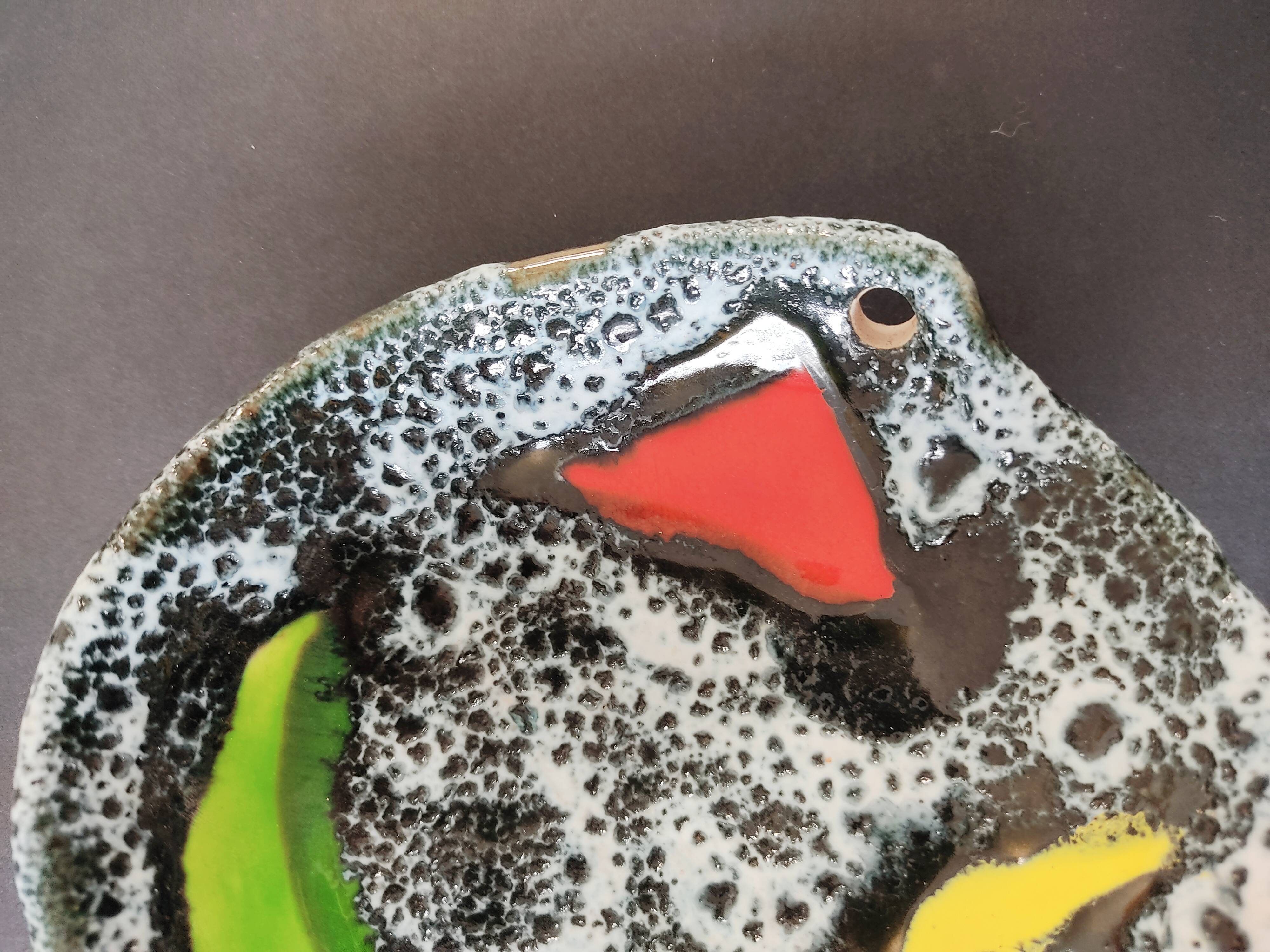 Empty black and white pocket with colored enamels