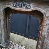 Patinated wooden fireplace