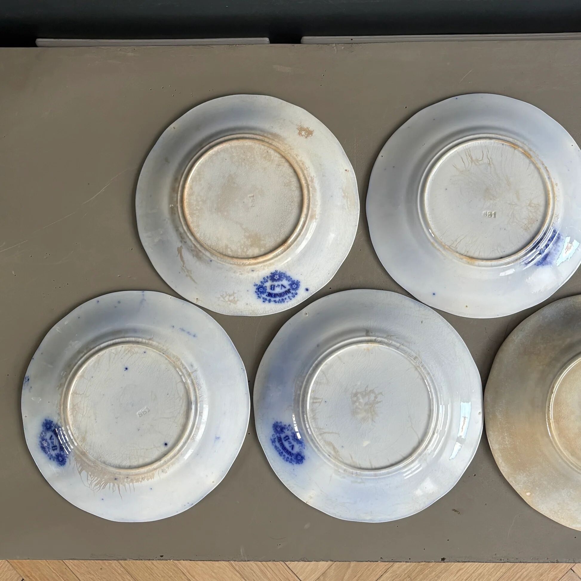 Stack of Sarreguemines plates, jardinière model.