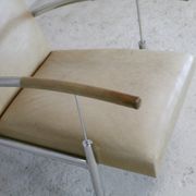 Tubular steel armchair and "cream" leather, France, circa 1970