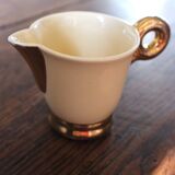 Ecru ceramic milk jug with gold decoration from Sarreguemines.