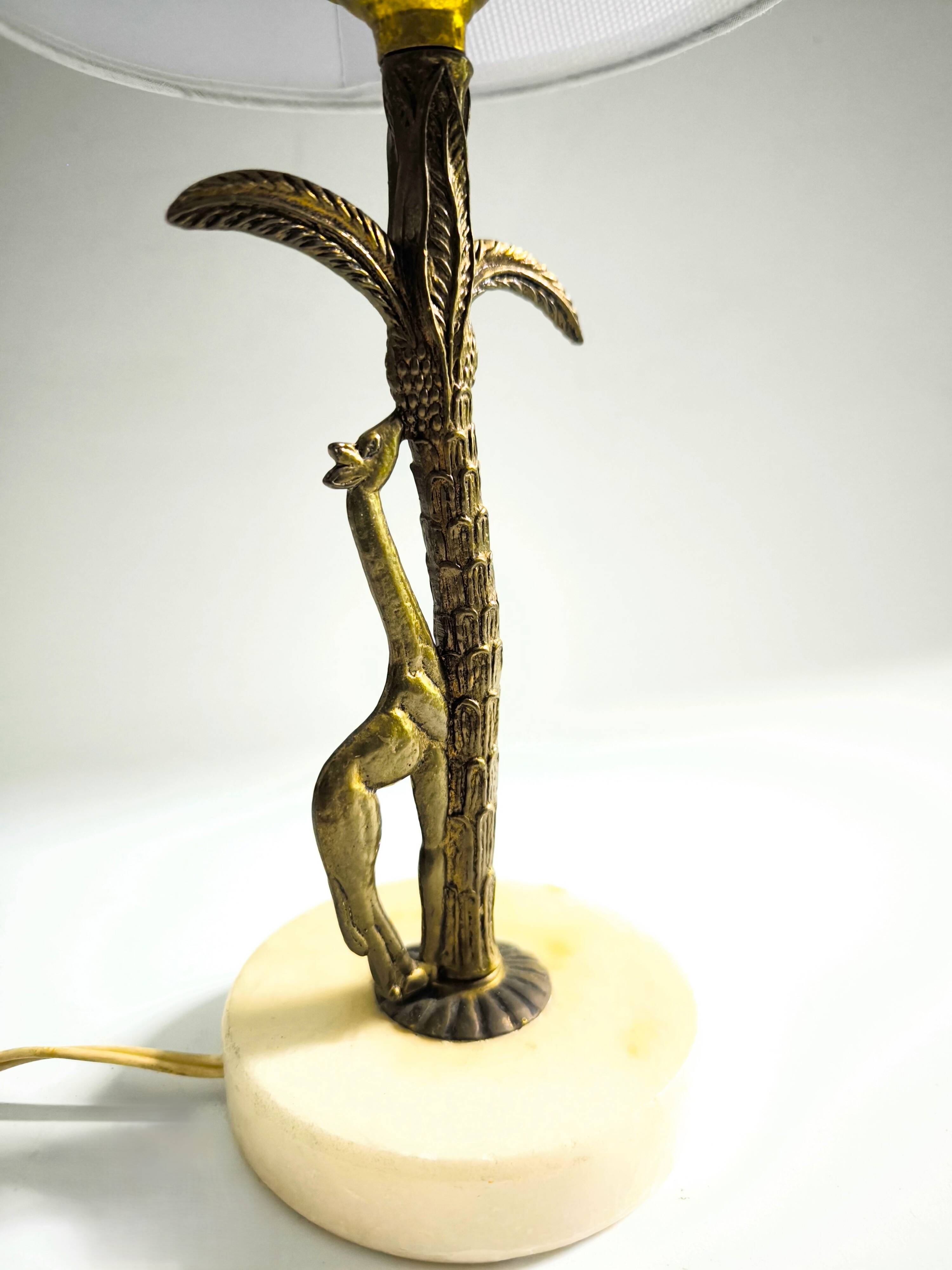 Bronze and marble lamp in Hollywood Regency style.