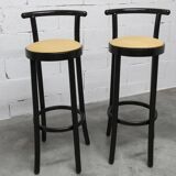 Pair of Baumann Dialog model stools in black and yellow and blue imitation leather, 1990
