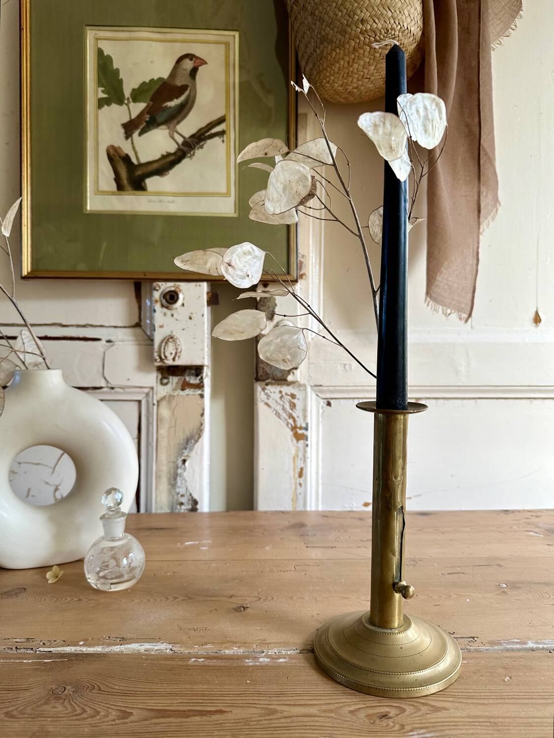 Old brass pull candle holder