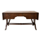 Antique wooden desk with a faux leather top and extensions.