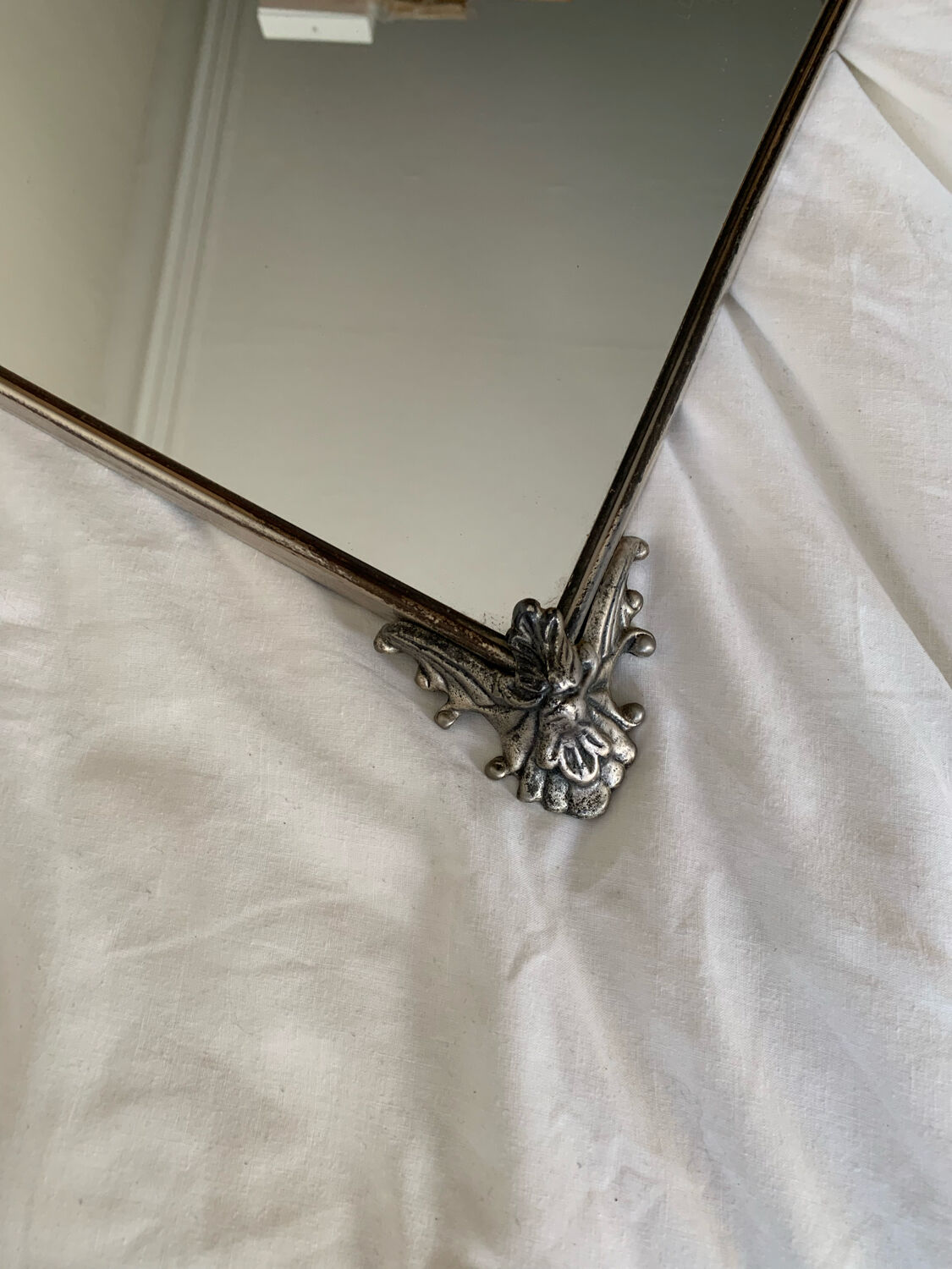 Silver metal mirror curved edge