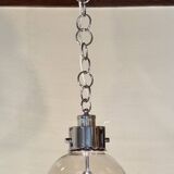 Designer chandelier in chrome metal globe in smoked glass