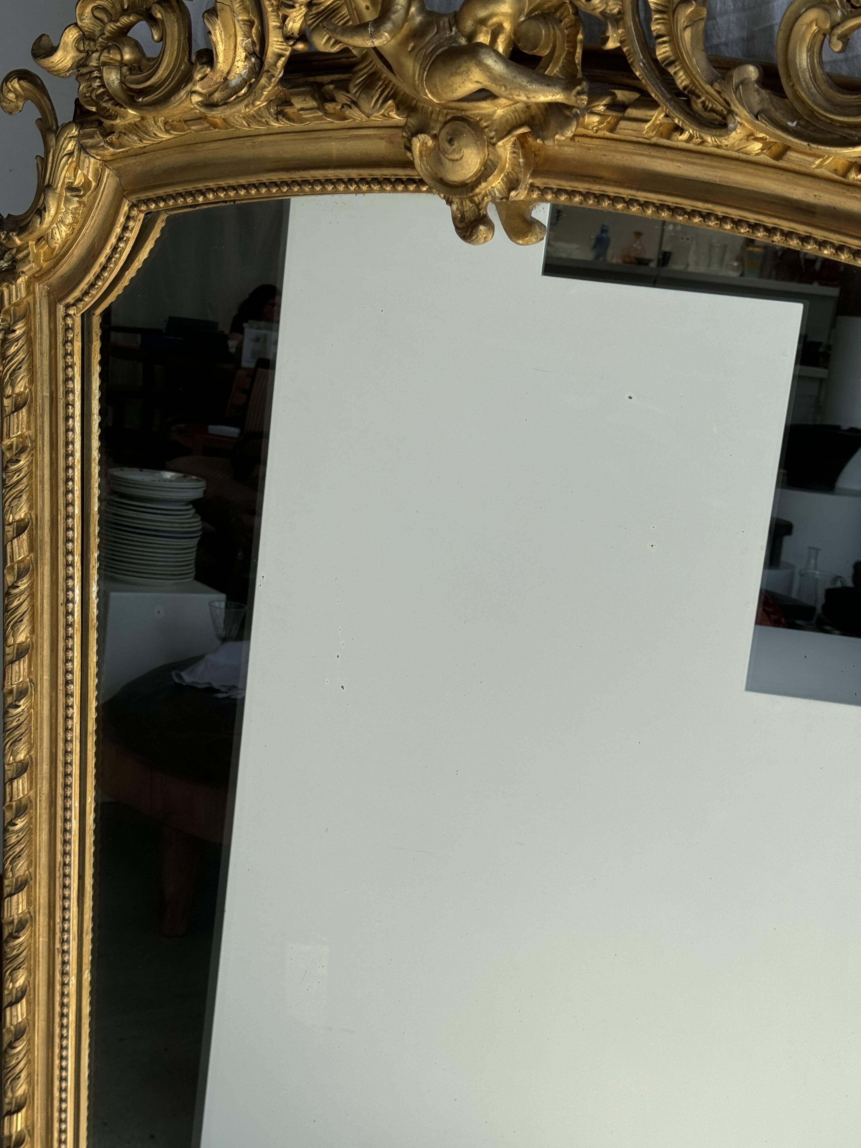 Large gilded mirror with acanthus leaf pediment H150 L98
