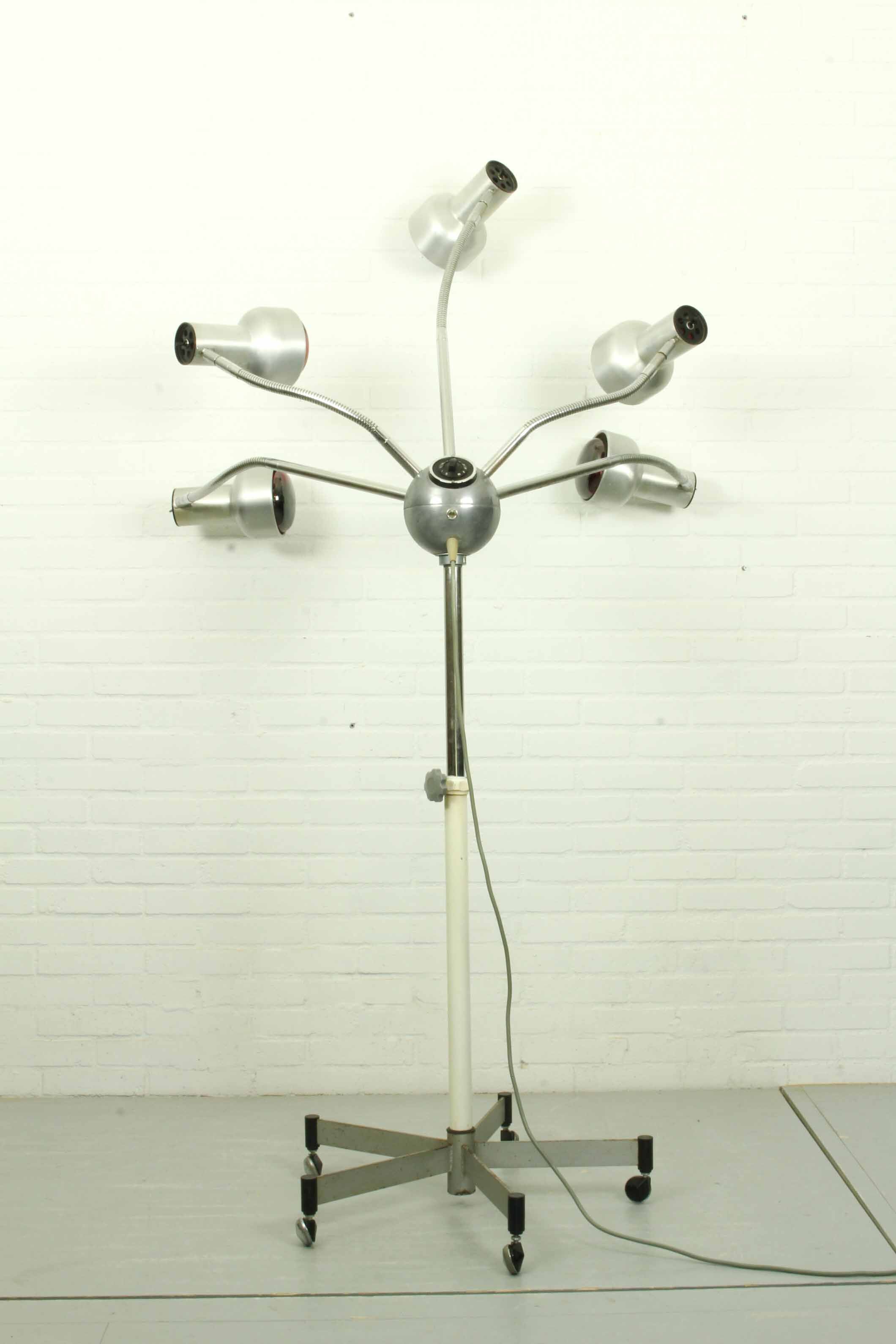 Chrome mid century modern adjustable five-arm lamp on wheel base