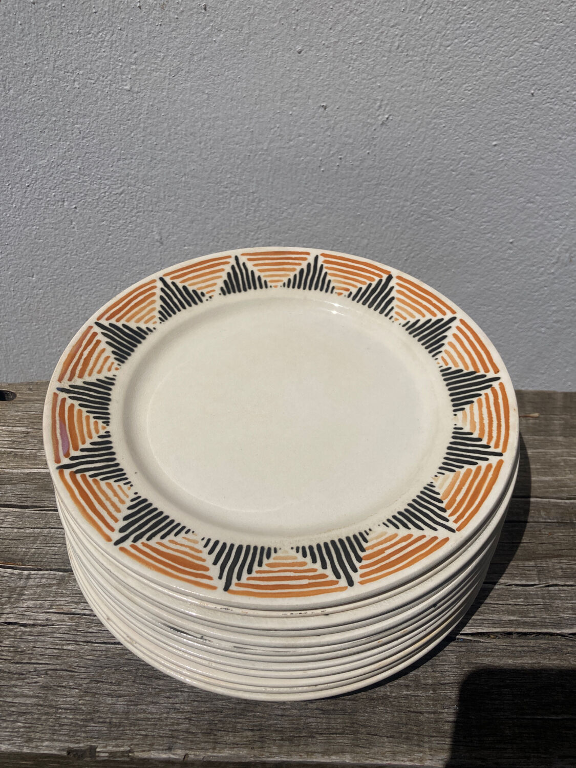 12 flat plates in yellow earthenware Badonviller