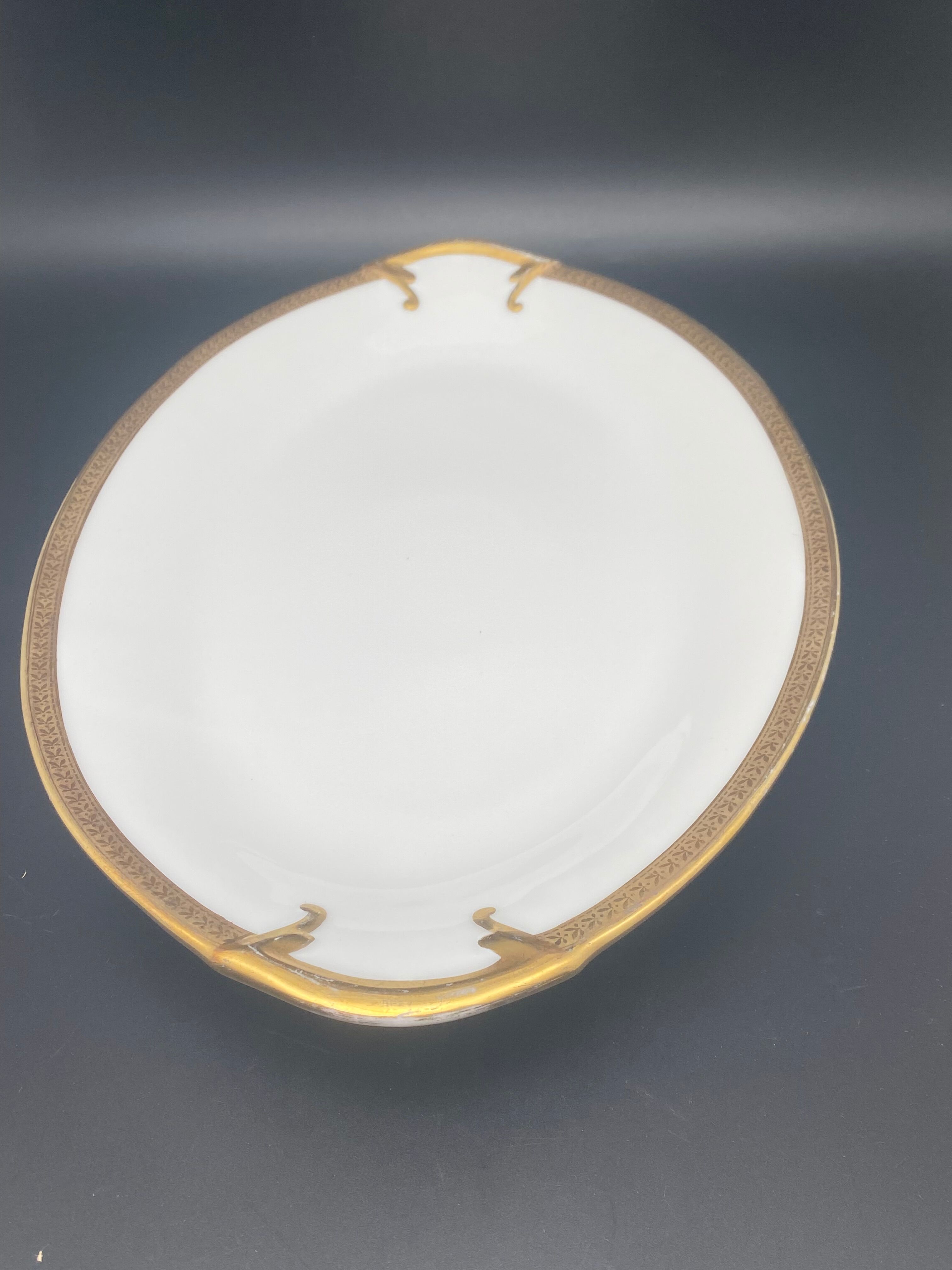 Oval flat Limoges golden tower