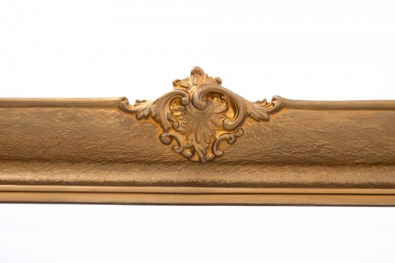 Large French mirror in a gold frame.