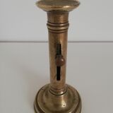 Vintage push candle holder