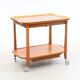 Scandinavian serving table on wheels made of wood and glass, Swedish design 1960.