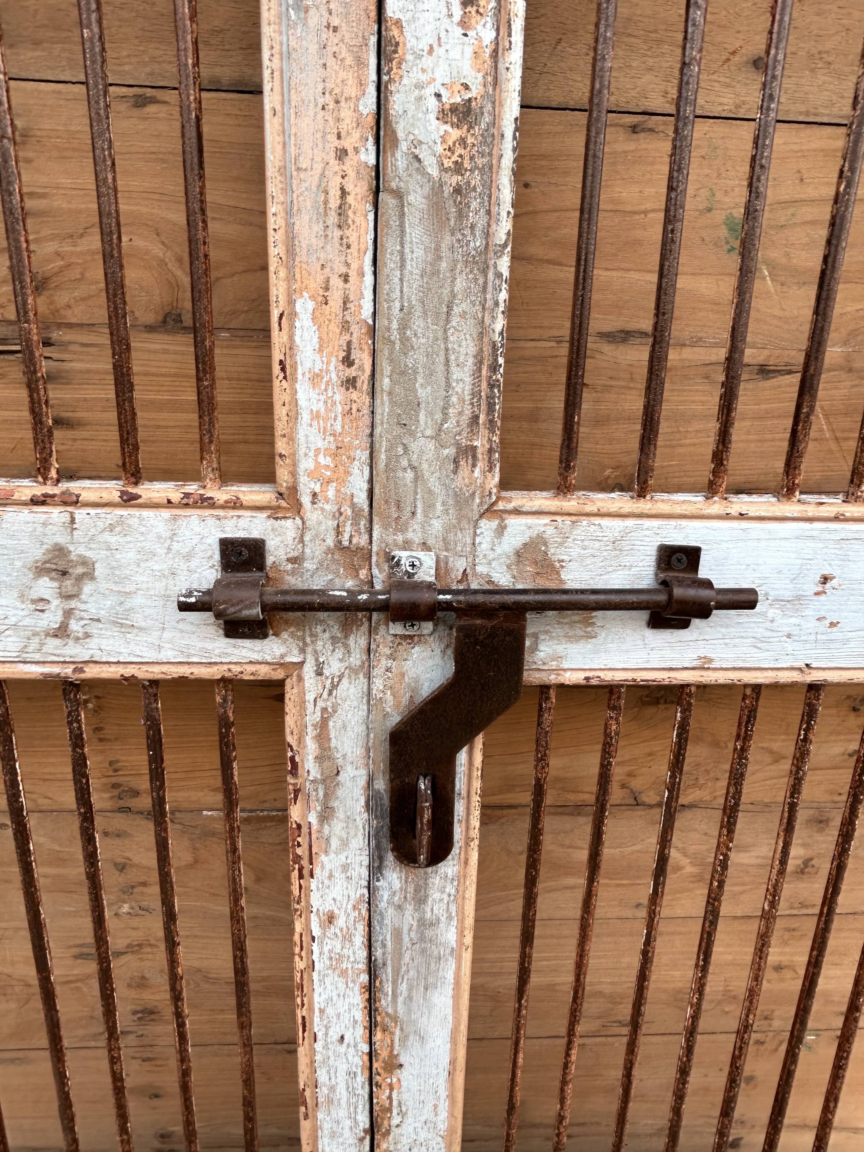 Art Deco patio door in Burmese teak with original patina.