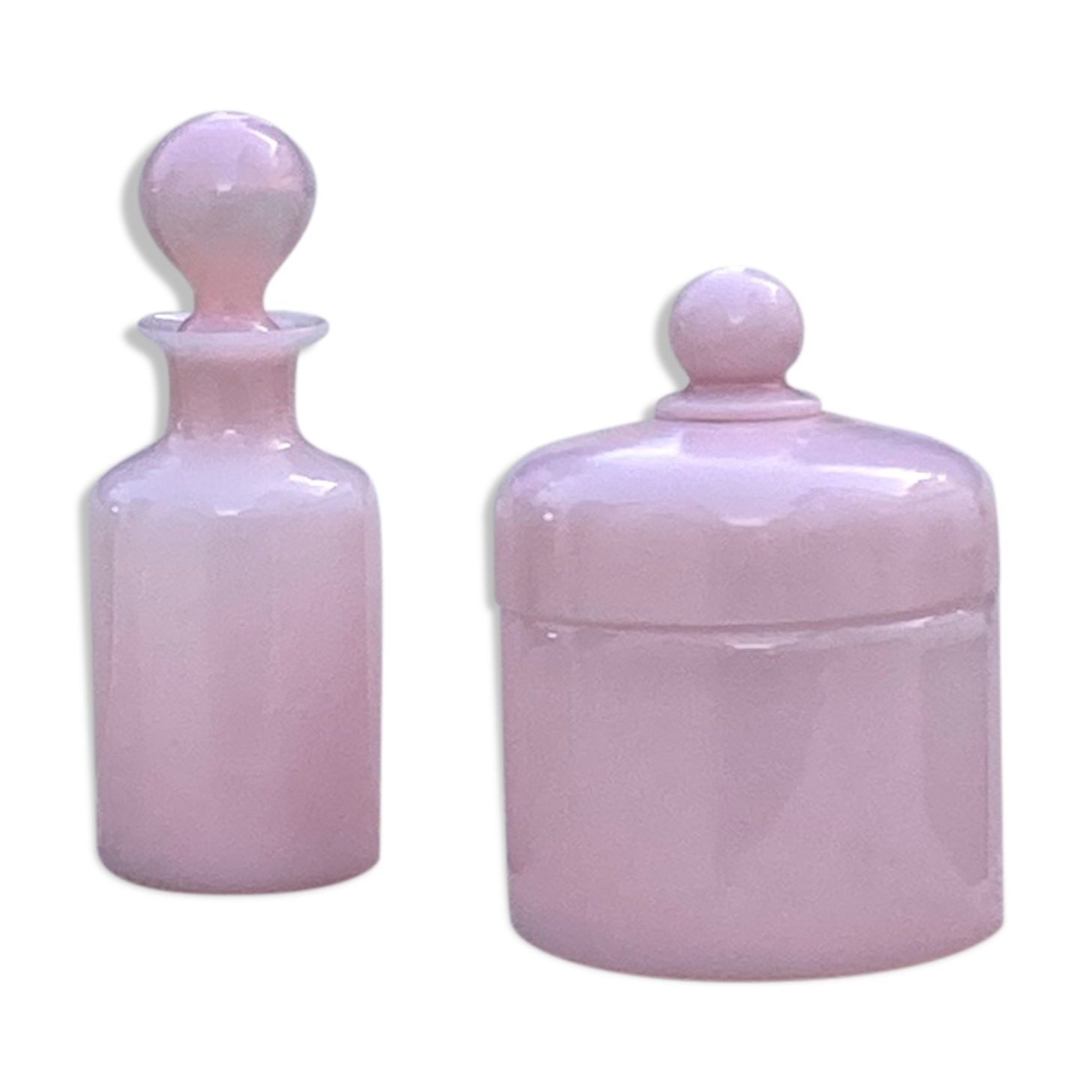 Two pink opaline bottles