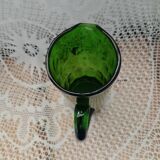 Old green pitcher