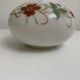 Old vase in opaline floral decoration painted